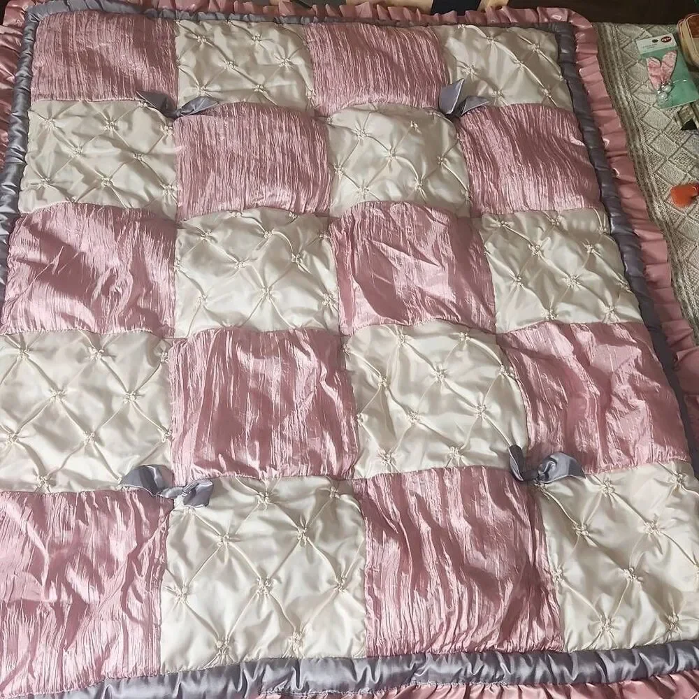The Peanutshell bella pink patchwork baby quilt